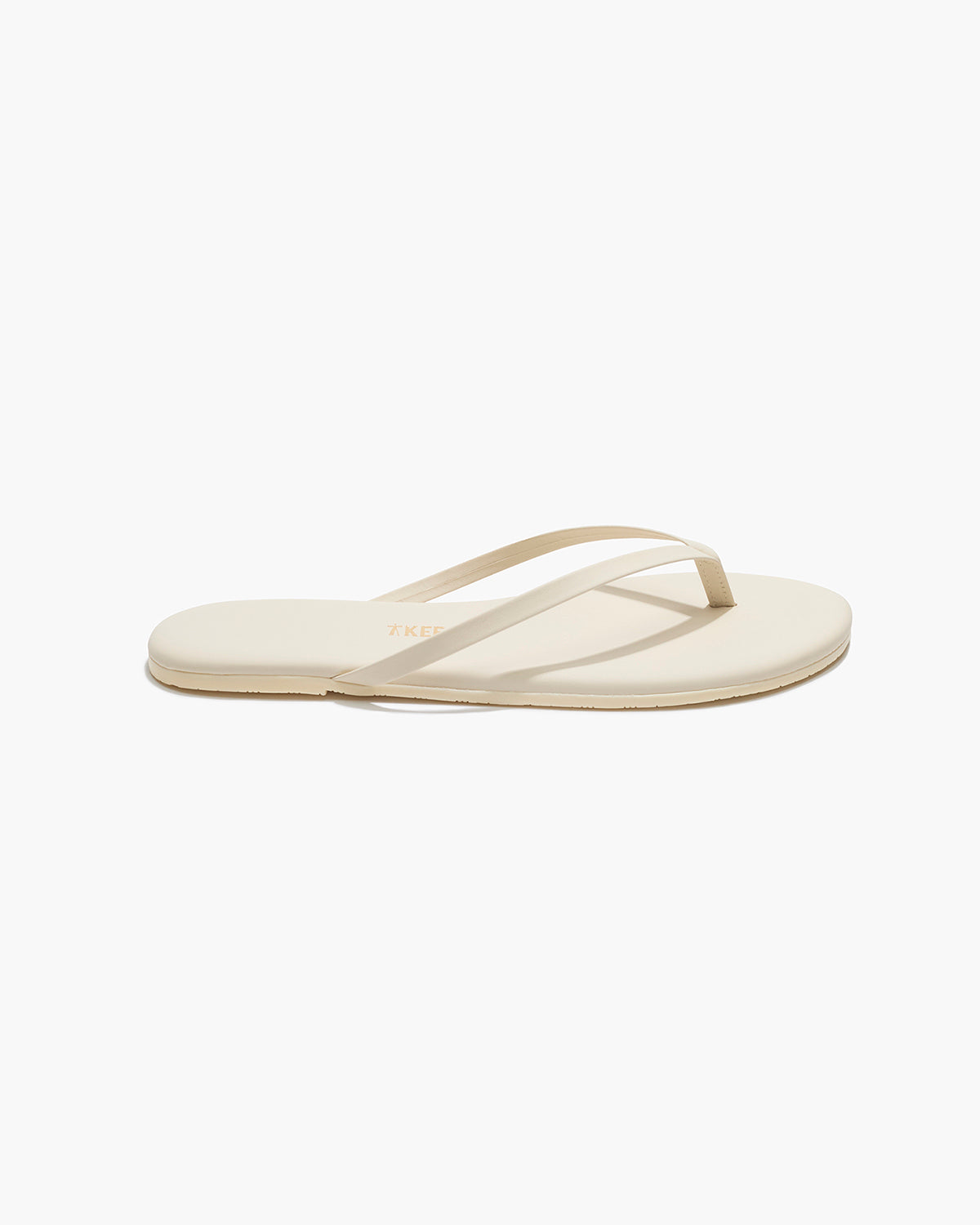 Lily Pigments Leather Flip Flops in Cream | TKEES Everyday
