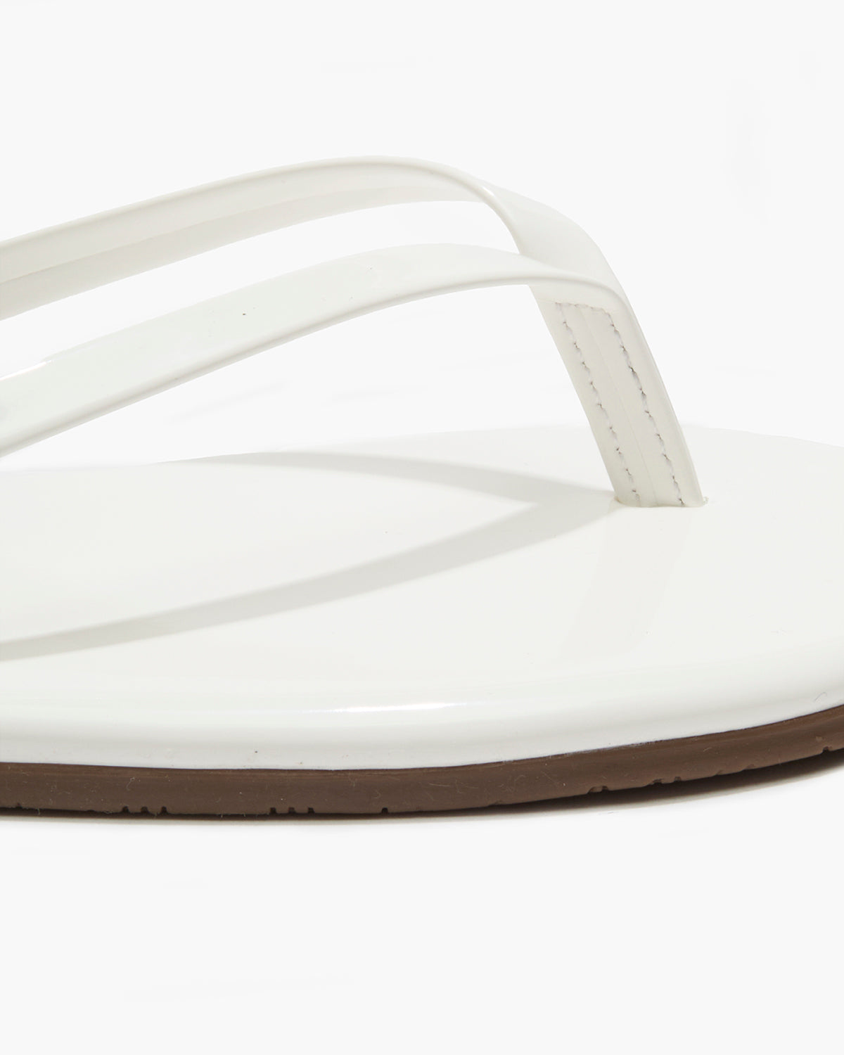 Lily Glosses Leather Flip Flops in White Lotus | TKEES Special Offer