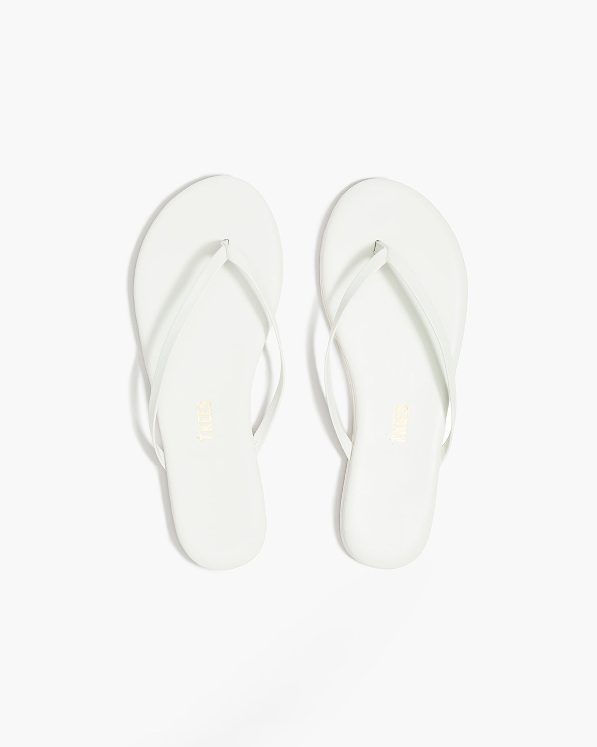 Lily Pigments Leather Flip Flops in White | TKEES Featured