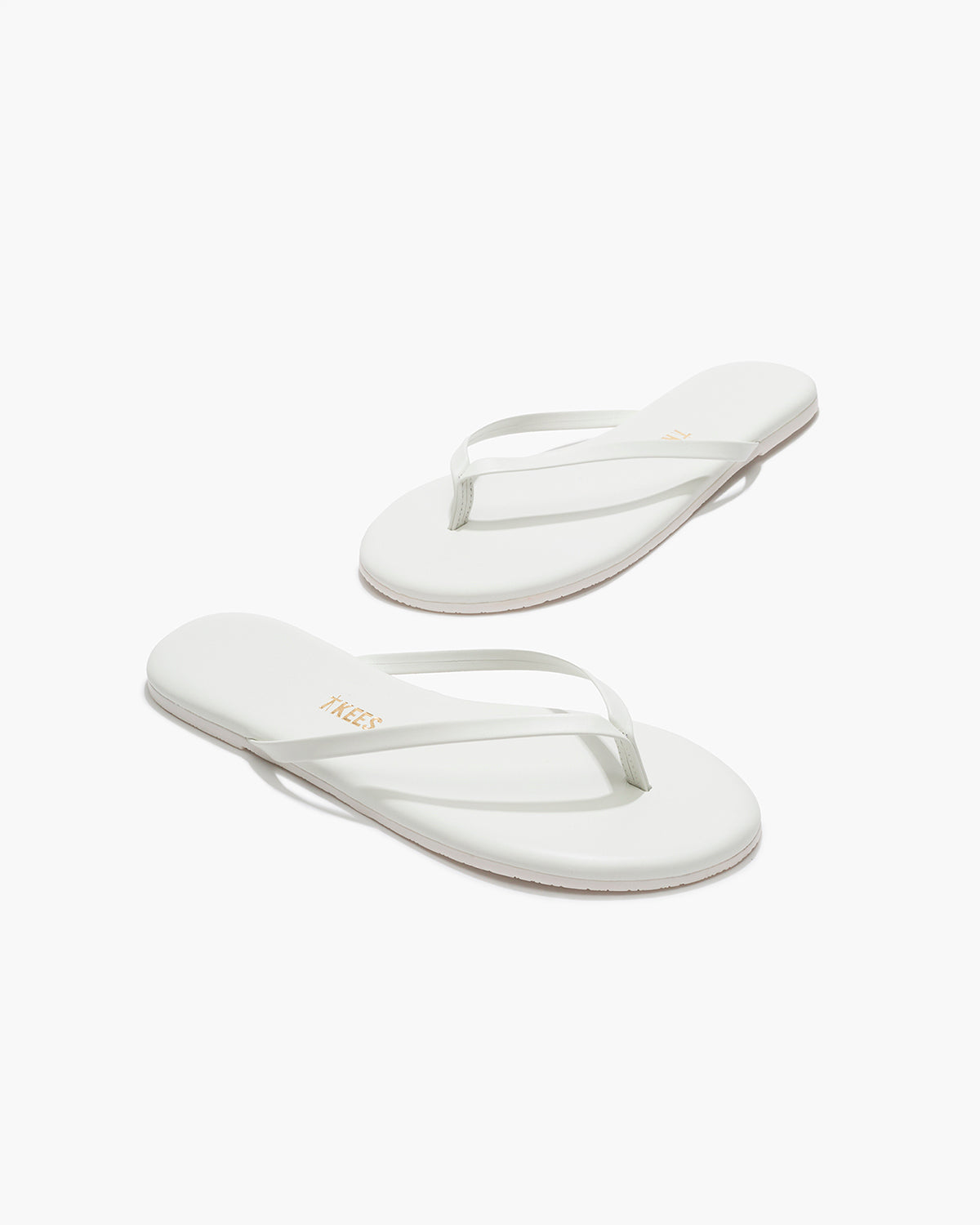 Lily Pigments Leather Flip Flops in White | TKEES Featured