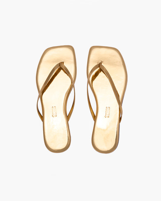 Square Toe Lily Mirror Leather Flip Flops in Gold | TKEES Exclusive