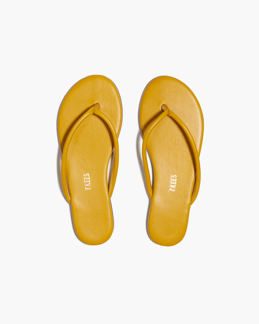 Tubular Lily Lemon Curry Flip Flops  | TKEES Best Price