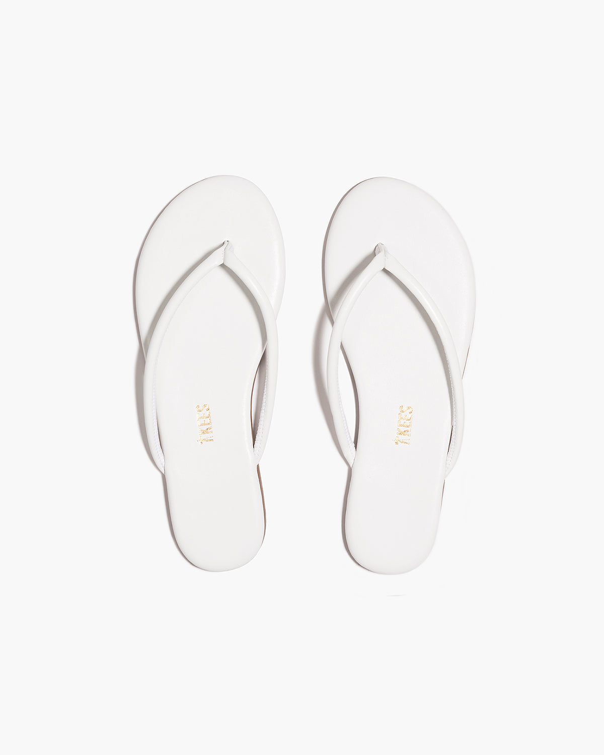 Tubular Lily White Flip Flops  | TKEES Latest